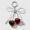 Nuevo de Primavera Exquisito Simple Dulce Fresco Alto Valor de Color Perla Artificial Encaje Leopardo Lazo Llavero Colgante de Bolso