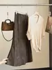 Saia midi de camurça cor de café com estampa de leopardo vintage para mulheres, saia de cauda de peixe de outono de cintura alta em linha A que afina