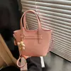 Bolso Cubo Tote de Gran Capacidad Transfronterizo para Mujer 2026 Primavera Nuevo de Moda Versátil con Patrón Granulado Bolso de Hombro Cruzado
