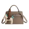 Bolsa Kelly de Venda Quente Transfronteiriça para Mulheres 2026 Nova Bolsa de Ombro Super Popular Versátil Leve Luxo Moda Bolsa Transversal