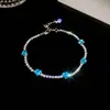[Cadena de Diamantes Arcoíris] Pulsera de extracción de zircón trenzado en cruz, una pulsera lujosa y de alta gama, una pieza de joyería delicada y de moda