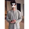Camiseta de punto texturizado de manga larga para hombre, de alta gama, elegante, con cuello Henley, para otoño, una capa base versátil