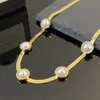 Cadena de Hueso de Serpiente Perla Moderna Sencilla Lujo Oro Acero de Titanio Collar Versátil Viajero Conjunto de Joyería de Moda