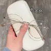 Nuevos Armazones para Gafas Retro Redondos de Metal Liso Artístico Ultraligeros Danyang Wholesale para Mujer de Gama Alta, Se Pueden Montar con Lentes Graduados