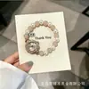 Relógio de pulso pulseira de contas imitação de cristal oval presente cultural e criativo ajuste livre tipo puxar feminino quartzo moderno pequeno
