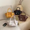 Bolso cubo de diseño de nicho transfronterizo para mujer, nueva colección otoño 2026, de alta gama, lujo discreto, adecuado para ir al trabajo, bolso de hombro o bolso cruzado