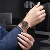 Reloj de Cuarzo para Mujer con Correa de Imitación de Cuero, Lazo y Relieve de Hojas, Moda Transfronteriza