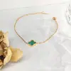 Pulsera de trébol de cuatro hojas transfronteriza para mujer, joyería de cuerda para la mano, accesorios, pulsera, adorno para la mano, accesorio de mano de alta gama de lujo ligero europeo y americano