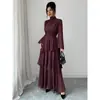 2026 comercio exterior transfronterizo falda de pastel color liso francés cuello de pie manga larga vestido irregular ropa de mujer