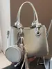 Bolso de mano versátil estilo coreano transfronterizo para mujer, nuevo bolso tipo cubo para el día a día 2026, bolso cruzado casual de alta gama