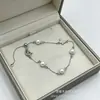 Pulsera de Perlas de Agua Dulce Naturales de Zhuji Mountain Lake con Elemento de Mariposa de Plata de Ley