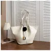 Bolso tote de cuero encerado vintage para el trabajo, nuevo bolso tote casual de gran capacidad de nicho, bolso de hombro versátil para mujer