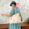 Bolso de Hombro Transfronterizo Estilo Nuevo para Mujer, Bolso de Mano de Lona de Gran Capacidad para Estudiante, Bolso de Estilo Universitario para Viajar, Bolso de Mamá al por Mayor