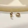 Pendientes de patrón de diamante europeos y americanos, ear cuffs de lujo de alta gama, modernos y versátiles para el uso diario, pendientes de botón de moda, pendientes de aro redondos