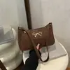 Moderna Lazo 2025 Nuevo Estilo Coreano Color Sólido Gran Capacidad Elegante Bolso de Hombro o Axila para Viajes Diarios para Mujer