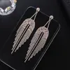 Pendientes de borla de diamante transfronterizos nuevos estilo discoteca pendientes de novia pendientes femeninos al por mayor E687