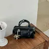 Bolsa de mão de moda transfronteiriça, bolsa tote pequena para mulheres, novo modelo outono 2026, cor sólida simples, versátil e texturizada, bolsa de ombro e transversal
