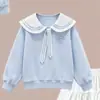 Conjunto de moletom de manga longa com gola boneca e saia, doce e estiloso, para meninas, exalando um charme de princesa.