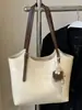 Bolso vintage muy elegante, nuevo modelo principios de otoño 2026, popular bolso de hombro texturizado, gran capacidad, bolso tote relajado y único
