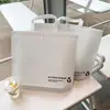 Sacolas de compras ecológicas de TNT com fivela para lojas de roupas, sacolas espessadas para vestuário masculino e feminino, embalagem por atacado, novo material para compras