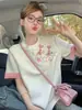 Nova camiseta de algodão puro com botões e bordado de manga curta para mulheres, de alta qualidade, moderna, moda nicho, top versátil