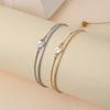 Nuevo brazalete de cobre bañado en oro con incrustaciones de circón para mujer de verano, cuerda para la mano de alta gama, venta al por mayor mixta, suministro para tienda de joyería física