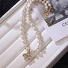 Colar de Pérolas de Trevo de Quatro Folhas de Flores Femininas All-match High-end Elegante Luz Luxo Clavícula Cadeia Colar Simples Acessórios de Jóias