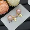 Pendientes Reversibles Dior/Dior 2025 Estilo Dulce Nuevo Letra Cd Nariz de Cerdo Estrella de Cinco Puntas Perla Rosa