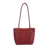 Bolso de alta gama con tejido hueco transfronterizo nuevo, bolso de axila, bandolera única, bolsa de compras para madre e hijo, bolsa de playa, coreano de nicho para mujer