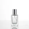 Botellas Rectangulares Transparentes de Perfume en Stock 30ml 50ml 100ml Botellas de Vidrio para Dispensar con Atomizador de Presión para Cosméticos