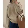 Suéter de punto de cable de lana pura de alta gama con bloques de color y cuello redondo para mujer, con un estilo relajado, un diseño engrosado y se puede usar como capa base o como prenda exterior.