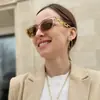 Nuevas Gafas de Sol de Cadena Ojo de Gato Moda 2024 Transfronterizas Europeas y Americanas Tendencia de Personalidad Gafas de Sol para Mujer