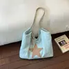 Bolsa de mano de gran capacidad, ligera y versátil, tela de nailon con estampado de estrellas, bolso de hombro casual para mujer 2026 nuevo con un toque relajado