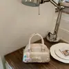 Bolsa de mão de comércio exterior feminina 2026 novo design de nicho de verão bolsa de ombro transversal retrô bolsa almofada para o dia a dia