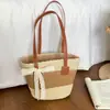 Bolsa de palha para viagem de férias na praia transfronteiriça para mulheres, nova bolsa de ombro da moda 2026 para o dia a dia, bolsa tote tendência