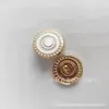 En stock botón de dos colores con anillo de aceite, chapado en metal, hebilla de pie alto, botón para camisa y abrigo, fábrica creativa, venta al por mayor directa