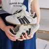 Zapatos de Entrenamiento Moral para Niños 2025 Otoño Nuevo Estilo Tenis de Suela Suave para Niñas Zapatos Planos de Encaje Estilo Ballet Zapatos Casuales para Bebé