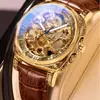 Reloj de lujo para hombre más vendido transfronterizo con relieve dorado, esfera calada a doble cara y correa de cuero con números romanos
