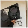 Bolso plisado de diseño único y nicho para mujer, nuevo bolso cruzado de moda 2026, bolso de mano pequeño súper popular, bolso de cuerno