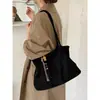 Bolsa Grande de Camurça Relaxada para Mulheres 2026 Nova Bolsa Tote Vintage para o Trabalho para Outono e Inverno Versátil Bolsa Escolar para Estudantes Universitários