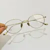 Gafas cat-eye cuadradas-redondas de titanio ultraligeras, ovaladas azules lisas bloqueadoras de luz azul, alambre dorado y plateado, se pueden adaptar con lentes recetados, montura de gafas Danyang para hombre