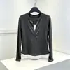 Nueva camiseta de otoño estilo coreano para chica popular, cuello medio abierto, diseño de dos piezas falsas con botones a rayas, ajuste ceñido, manga larga, para mujer