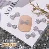 Venta al por mayor Joyería de Circonita para Manicura Pajarita Accesorios para la Punta del Dedo Lujo Ligero Oro y Plata Diamante Decoraciones de Uñas Portátiles