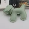 Estoque de Fábrica Bolsa para Filhote com Enchimento de Algodão Pingente Moda Criativa Couro PU Pingente Chaveiro de Carro para Filhote Telefone