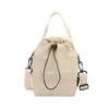 Los bolsos tipo cubo de estilo coreano están de moda este año.; aquí está la colección de otoño 2026 de bolsos de hombro lisos y minimalistas y bolsos cruzados versátiles para mujer