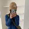 Al por mayor 25 Años Otoño e Invierno Nuevo de Alta Calidad Color Sólido Parche Circunferencia de Cabeza Grande Gorro de Punto Casual Cálido y a Prueba de Frío Gorro de Lana