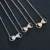 Collar Colgante Doble Corazón de Melocotón Transfronterizo Moda Creativa Cobre Chapado en Platino Microincrustado Circonita Cadena para Clavícula de Mujer