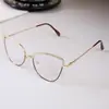 Monturas de gafas de moda transfronterizas europeas y americanas con decoración de diamantes de imitación, gafas fotocromáticas de ojo de gato para mujer de moda, anti-luz azul al por mayor