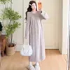 Ropa de maternidad otoño e invierno nuevo estilo vestido de punto trenzado con corbata cuello redondo manga larga suelto cubre el vientre estiliza prenda exterior falda larga