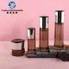Conjunto de garrafas de vidro cilíndricas em estoque 40-120ml para água, loção e essência, frascos para creme facial 20g 30g 50g, materiais de embalagem